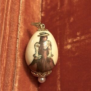 Vintage hand painted quail egg pendant